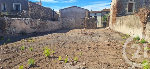 Afficher la photo en grand terrain à vendre - 340.0 m2 - LEZIGNAN LA CEBE - 34 - LANGUEDOC-ROUSSILLON - Century 21 Agi Immobilier
