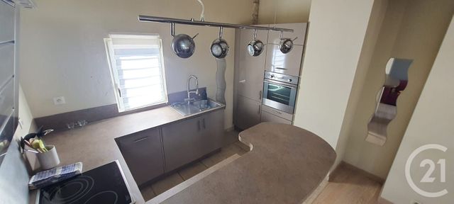 Appartement T2 à louer - 2 pièces - 51.0 m2 - PEZENAS - 34 - LANGUEDOC-ROUSSILLON - Century 21 Agi Immobilier