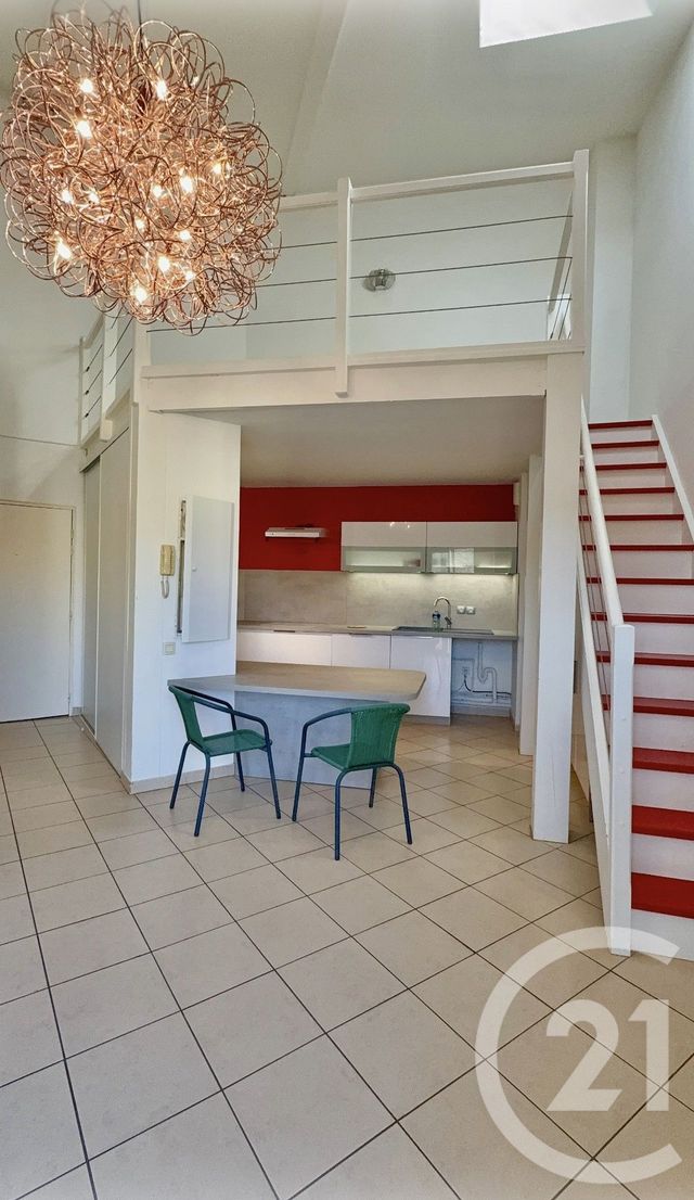 Appartement F2 à louer - 2 pièces - 54.08 m2 - PEZENAS - 34 - LANGUEDOC-ROUSSILLON - Century 21 Agi Immobilier