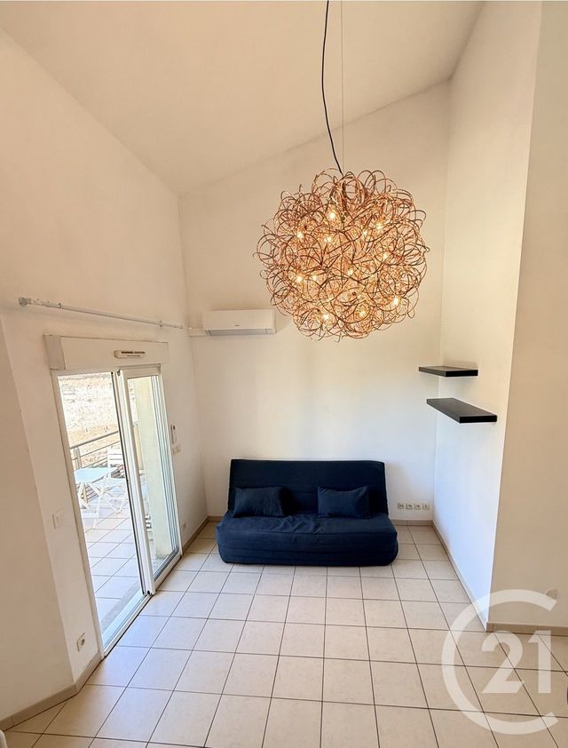 Appartement F2 à louer - 2 pièces - 54.08 m2 - PEZENAS - 34 - LANGUEDOC-ROUSSILLON - Century 21 Agi Immobilier