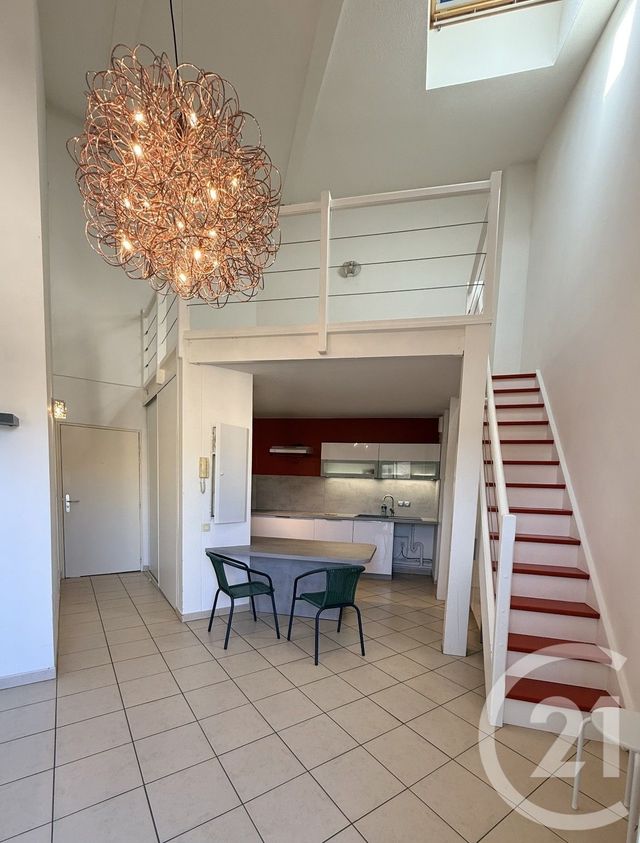 Appartement F2 à louer - 2 pièces - 54.08 m2 - PEZENAS - 34 - LANGUEDOC-ROUSSILLON - Century 21 Agi Immobilier