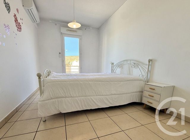 Appartement F2 à louer - 2 pièces - 54.08 m2 - PEZENAS - 34 - LANGUEDOC-ROUSSILLON - Century 21 Agi Immobilier