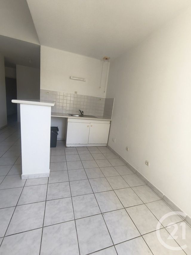Appartement F3 à louer - 3 pièces - 69.0 m2 - PEZENAS - 34 - LANGUEDOC-ROUSSILLON - Century 21 Agi Immobilier