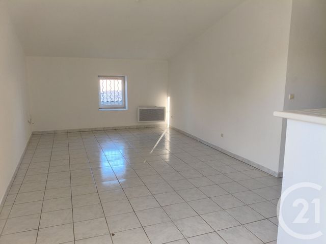 Appartement F3 à louer - 3 pièces - 69.0 m2 - PEZENAS - 34 - LANGUEDOC-ROUSSILLON - Century 21 Agi Immobilier